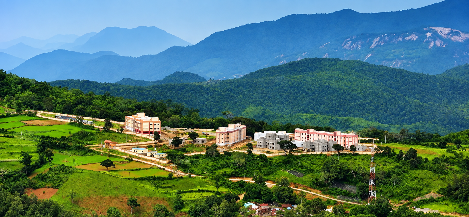 Wide aerial view of the EMRS Ananthagiri residential campus and surrounding green hills