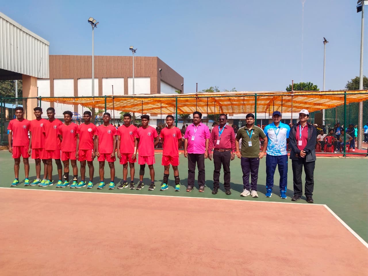 EMRS Ananthagiri hockey team with staff at a sports event