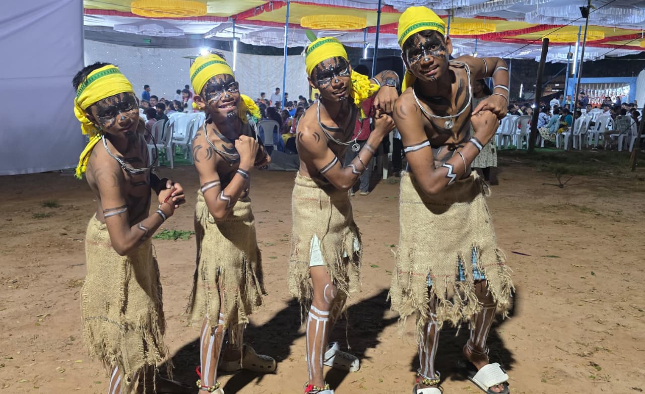 EMRS Ananthagiri students performing a traditional cultural dance at a school event